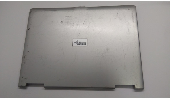 Кришка матриці корпуса для ноутбука Fujitsu Amilo A1650G, 15.0", 60.4b309.002, Б/В. Всі кріплення цілі. Є маленька тріщина (фото). Присутні подряпини та потертості.