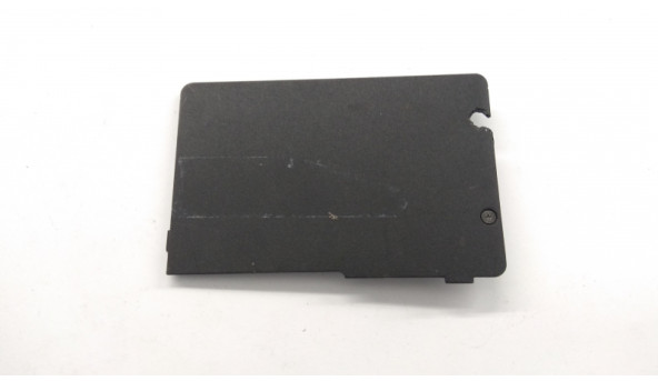 Сервісна кришка для ноутбука Toshiba Satellite A500, A500D, AP077000100, Б/В. Зламане кріплення (фото). Має подряпини.