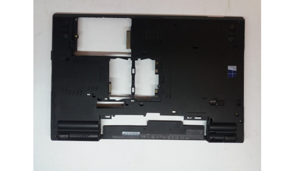 Нижня частина корпуса для ноутбука Lenovo  IBM Lenovo ThinkPad T530, 15.6", 60.4QE01.003, Б/В. Зліва зверху трішина, зламана рішітка радіатора.